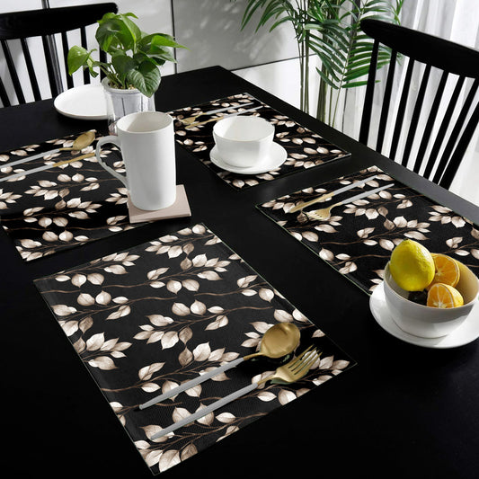 Dark Brown Leaves on Black Placemats by Mark van Vuuren