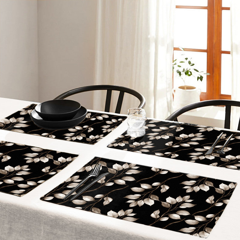 Dark Brown Leaves on Black Placemats by Mark van Vuuren