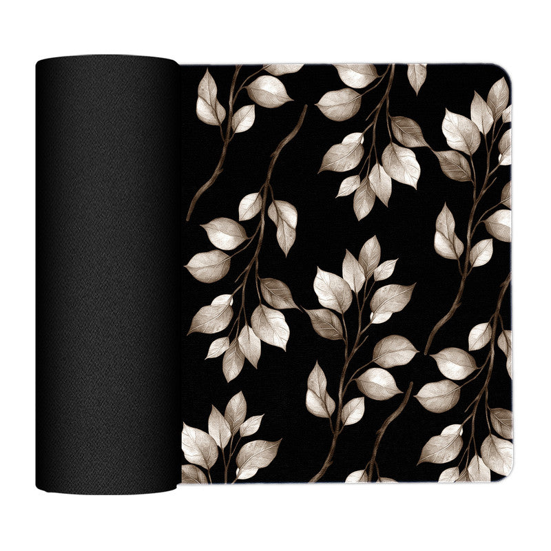 Dark Brown Leaves on Black Placemats by Mark van Vuuren