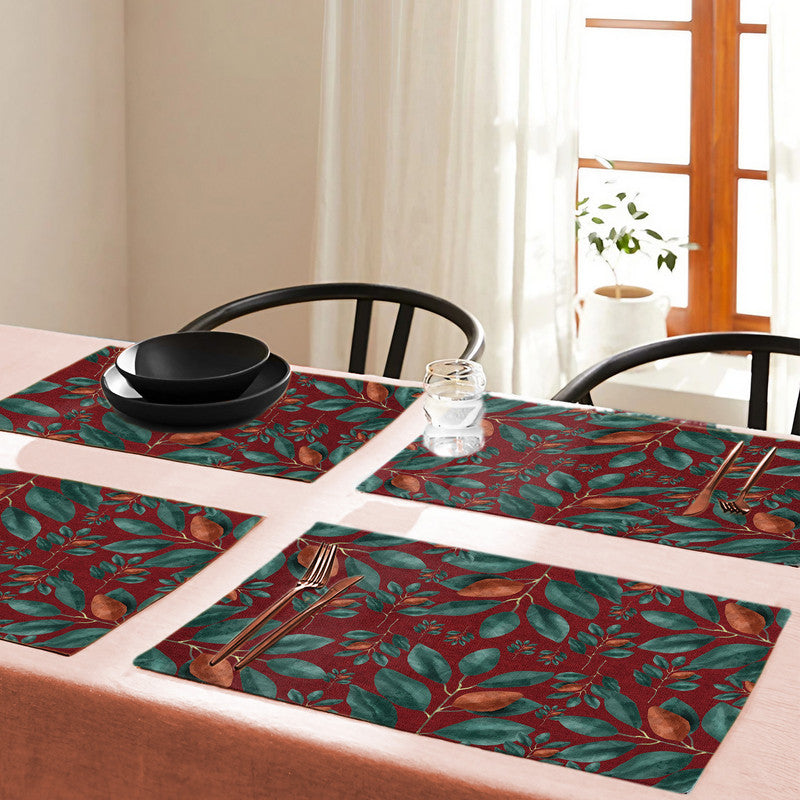 Green Leaves on Red Placemats By Mark Van Vuuren