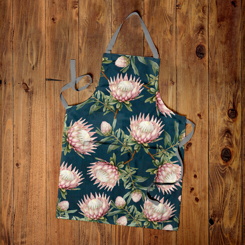 Proteas on Teal Medium Length Apron By Mark Van Vuuren