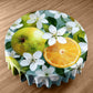 Citrus Bloom Burst Round Tablecloth by Wikus Schalkwyk