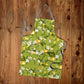 Lemon On Green Apron by Mark van Vuuren