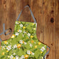 Lemon On Green Apron by Mark van Vuuren