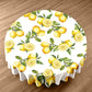 Lemons On White Round Tablecloth by Mark van Vuuren