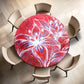Shadow of White on Red Round Tablecloth